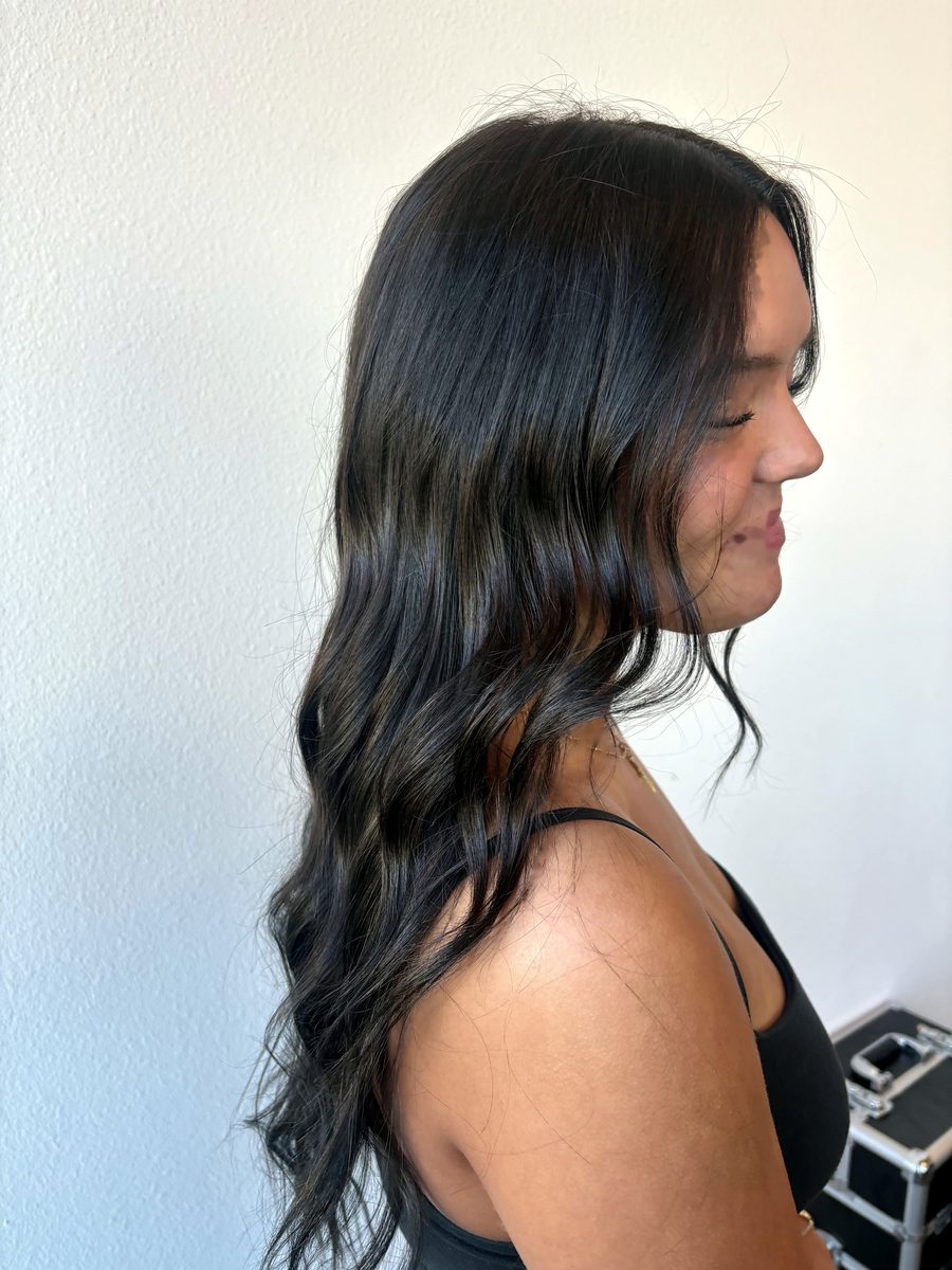 Black waves, side profile, client smiling by Leila Lee