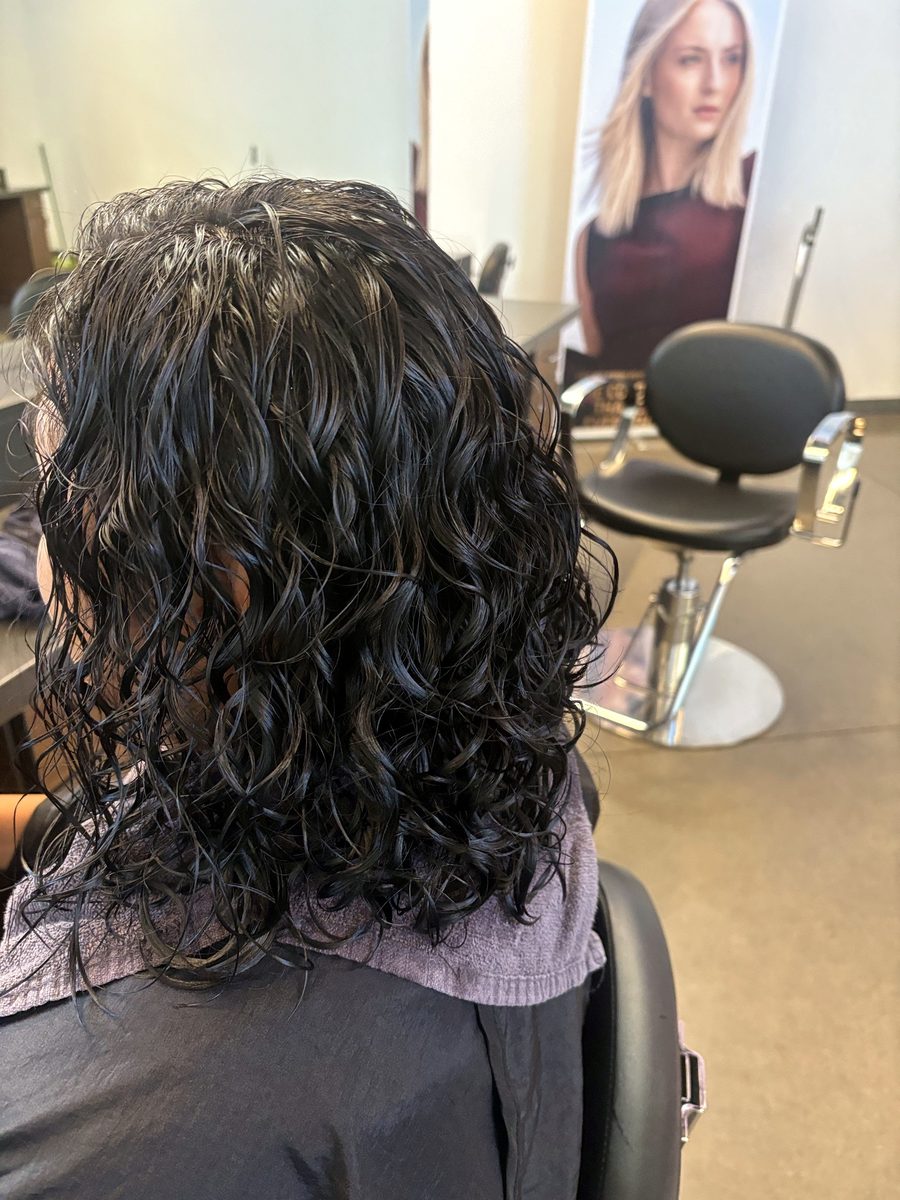 Fresh perm, defined wet curls, mid-length by Leila Lee